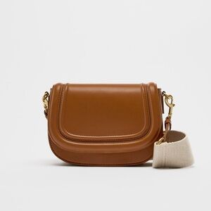Crossbody/ Shoulder saddle bag in brown PU leather